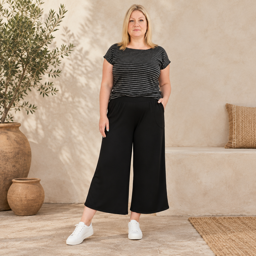 black resort pants and striped top