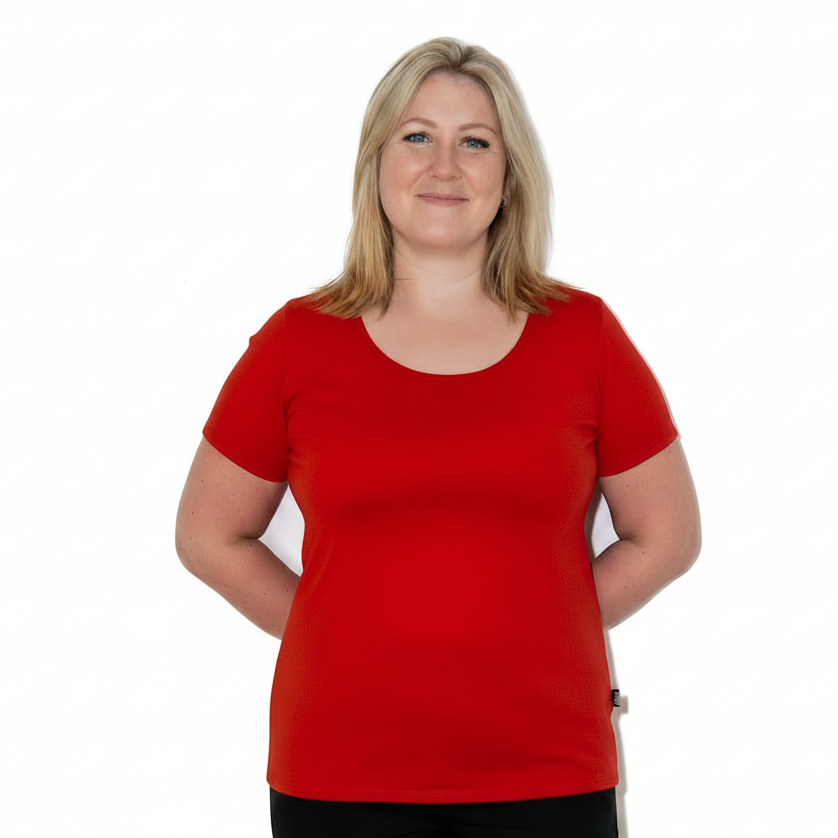 Woman wearing orange merino scoop neck tshirt 